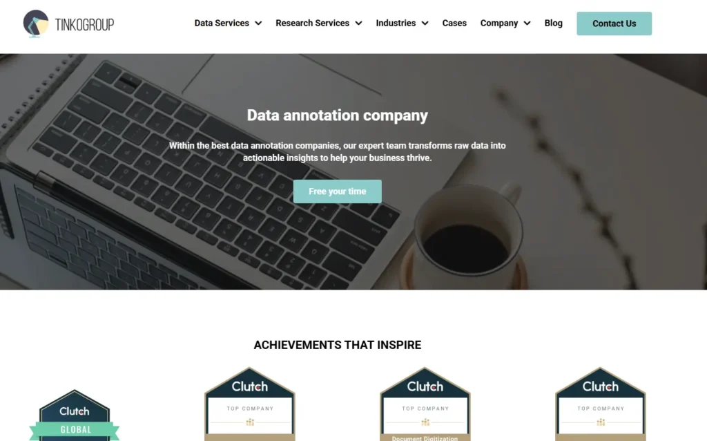 Top Data Entry Companies — Tinkogroup data annotation and data entry services homepage with laptop workspace